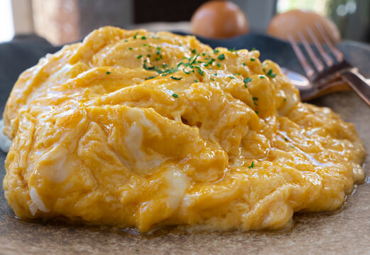 Scrambled eggs on a plate. Ready to eat
