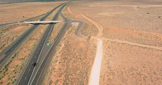 An aerial view of highway, which is located in desert environment near San Jon, New Mexico western side America.