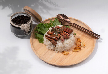 Topped Grilled pork neck with rice and tabasco isolated on white, Thai food, Quick meal
