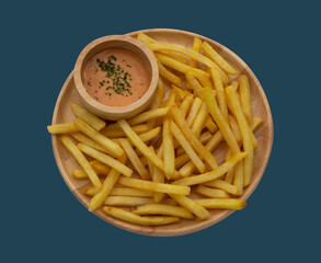 French fries with sauce on blue background. clipping path