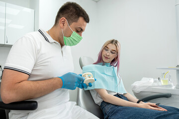 examination of a dentist treating a female patient who came to him with complaints.
