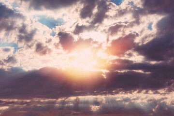 Fototapeta na wymiar Bright cloudy magic sky. Cloudscape with copy space. Sunrise and heaven