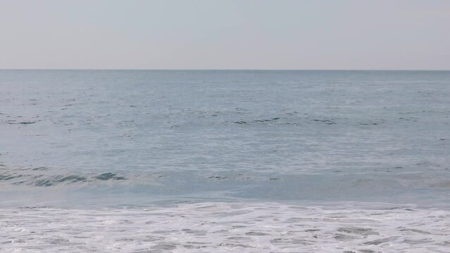 Drone Footage of Ocean waves in a small and beautiful beach in Viana do Castelo. Summer time.