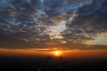 Atmospheric sunset over the city