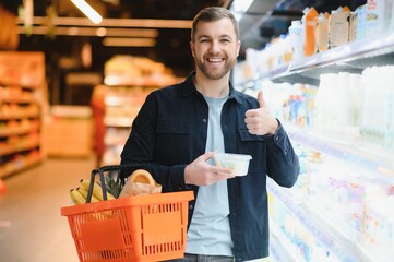 Man shopping in a supermarket