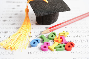 Math number with graduation gap hat on answer sheet test choice for learning Mathematic, education...