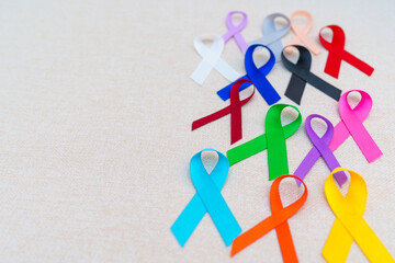 World cancer day, February 4. Colorful ribbons for supporting people living and illness. Healthcare, fighting, medical and National Cancer Survival day, Autism awareness day concept