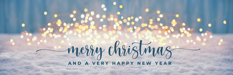 Merry Christmas and Happy New Year Card  -  Blue Winter Background with Shiny Golden Bokeh Lights,  Banner, Panorama - 554818600