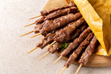 Arrosticini. Italian lamb skewers or kebabs cooked on a brazier. From the Italian region of Abruzzo and Molise. © Olga