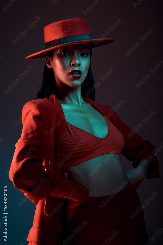 Wall mural fashion, red aesthetic and woman in dark studio with neon background in trendy, stylish and cool out - Wall murals
