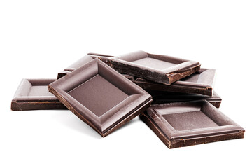 Dark chocolate pieces, cubes on a heap, broken chocolate isolated on white background
