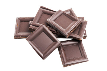 Dark chocolate pieces, cubes on a heap, broken chocolate isolated on white background