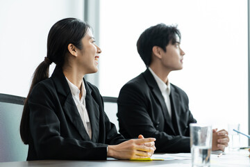 image of a group of Asian businessmen working together at the company