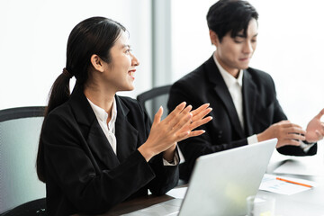 image of a group of Asian businessmen working together at the company