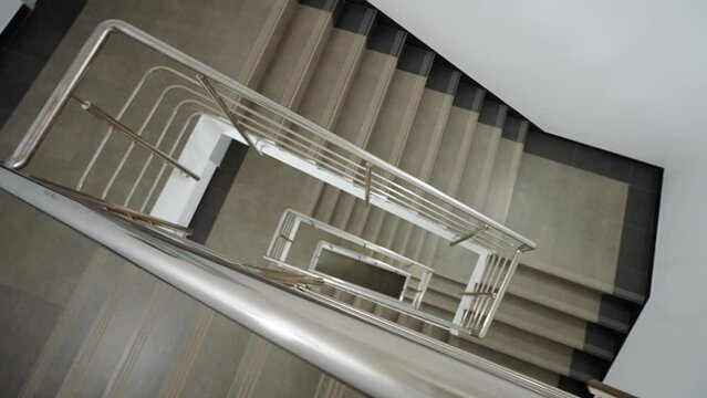Spaces without people, view of the staircases in the office building, walking in an empty building, fire exit.