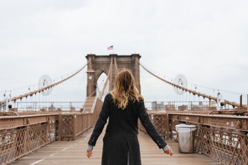 Woman at Brooklyn Bridge New York City