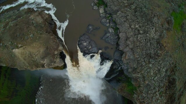 Drone Top View Over Massive Waterfall Drop Off