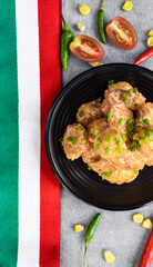 Reforma sriracha mayonnaise shrimps on table with mexican decorations 