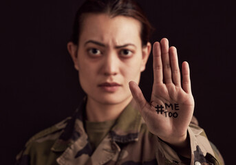 Military woman, hand and hashtag me too against abuse or rape on black studio background. Face...