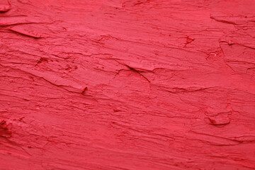 Texture of bright lipstick as background, closeup