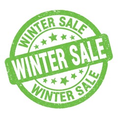 WINTER SALE text written on green round stamp sign.