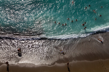 Fototapeta premium People swimming in sea, view from above, Tourism holiday concept 2023.