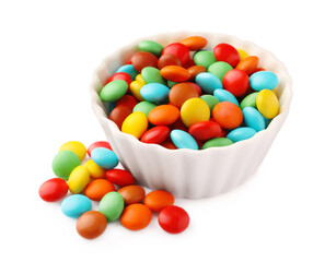 Bowl with colorful candies on white background