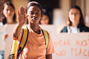Hand, stop or black woman at a student protest for free public education, government funding or...