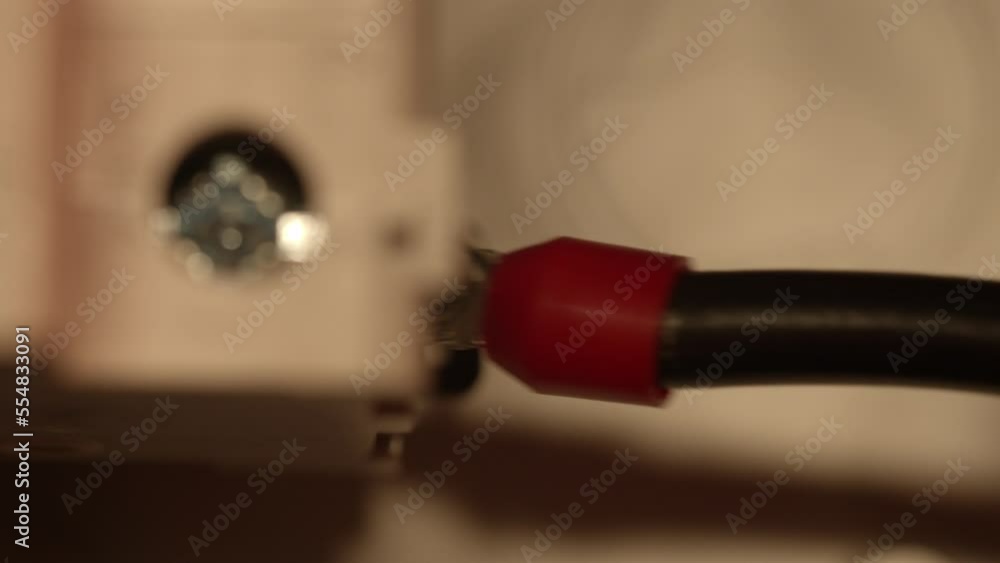 Poster close up of the wire fixing in the switch box. electrician fixing wire