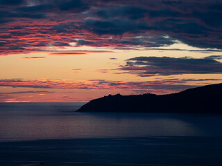 Sunset over Finisterre Cape, Galicia, Spain. Sunset in the final step of the Camino de Santiago.