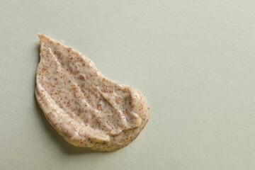 Sample of scrub on light background, top view. Space for text