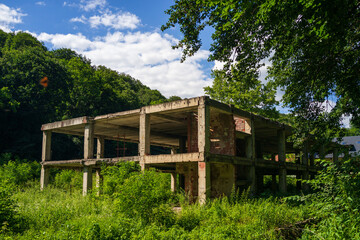 old unfinished concrete building in the forest