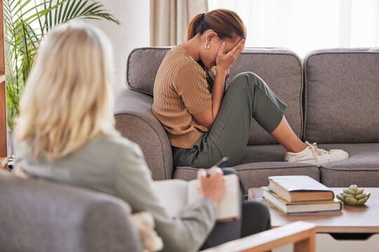Woman, psychology and crying in therapy for mental health, stress and anxiety risk. Depression, crisis and sad patient in tears at psychologist, therapist or counseling support, help and consultation