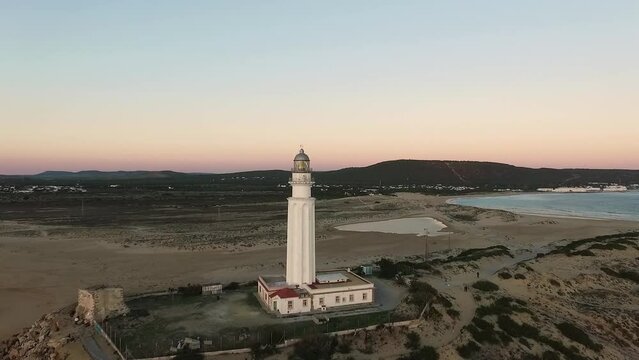 Late Evening circular view of the Trafalgar Lighthouse just around sunset as the town lights start to come up