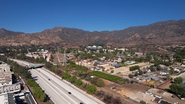 Aerial View of Sylmar Neighbohood of Los Angeles USA and Traffic on Interstate I-210 Highway
