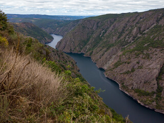 Fototapeta na wymiar View of Canyon del Sil from Miradoiro de Vilouxe near Parada de Sil in Galicia, Spain, Europe. The Sil Canyon is, undoubtedly, one of the Ribeira Sacra’s most important attractions.