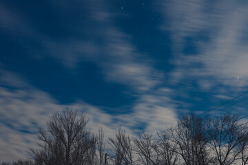 Scenic view of the city of Dnepr in the winter evening. Dnipro in the evening. Ukrainian city in winter at night. background image. Panoramic view. Long exposure photo of the Dnieper River at night.
