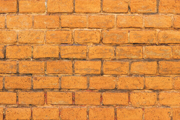 Texture of worn rustic brick wall surface as background
