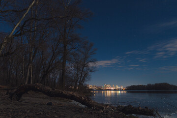 Scenic view of the city of Dnepr in the winter evening. Dnipro in the evening. Ukrainian city in...