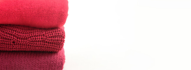 woolen knitted sweaters, three shades of red, three fabric structures