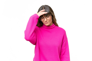 Young caucasian woman over isolated background with headache