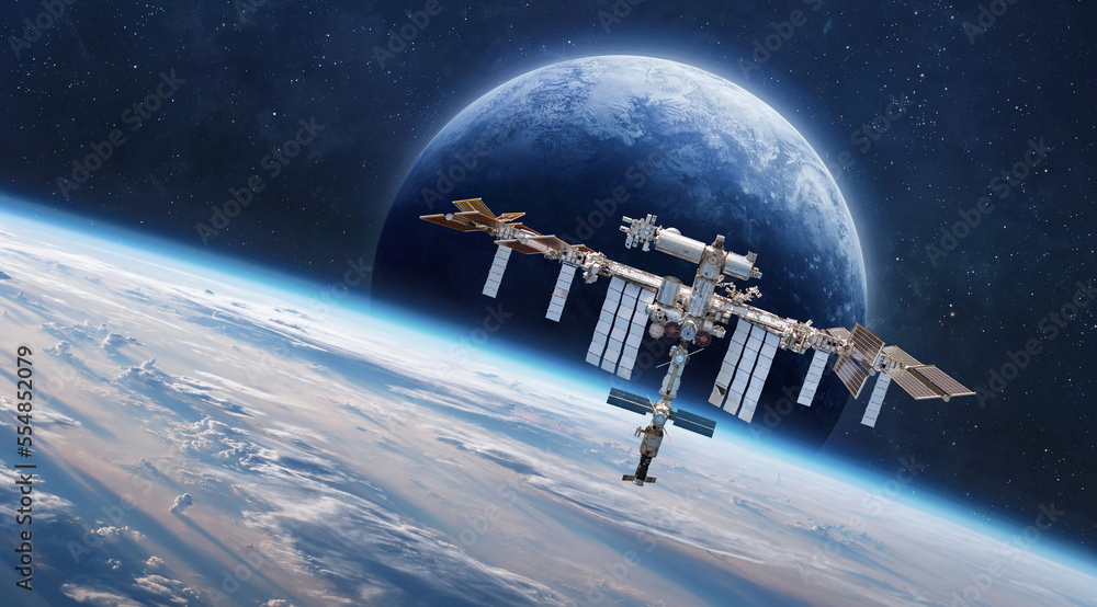 Poster International Space station on orbit of Earth. Space wallpaper with ISS and planet surface. Astronauts in space. Elements of this image furnished by NASA