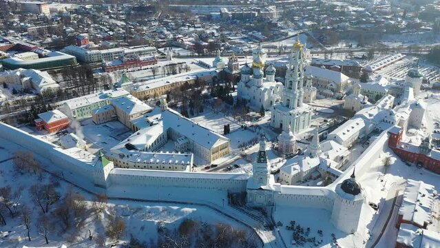 Winter view from a drone of the Trinity-Sergius Lavra and residential areas of the city of Sergiev Posad, Russia.