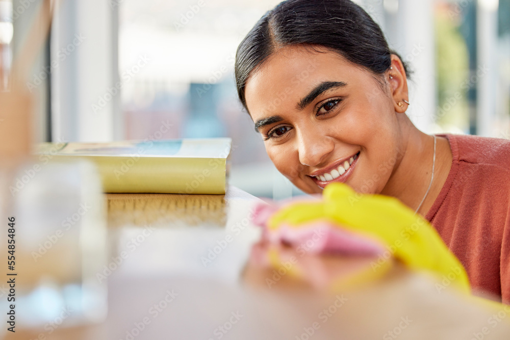 Poster Cleaning, surface and woman with cloth for dirt, dust and bacteria on furniture at home. Happy cleaner, housekeeping and maid wipe table, shelf and living room for routine maintenance, safety or care