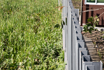 Black steel fence outside the park industry style