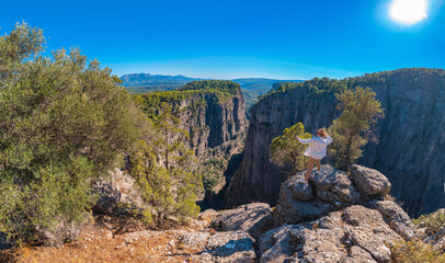 Travel aerial top view Turkey, man hiker stands background mountain Tazi Canyon in Manavgat Antalya