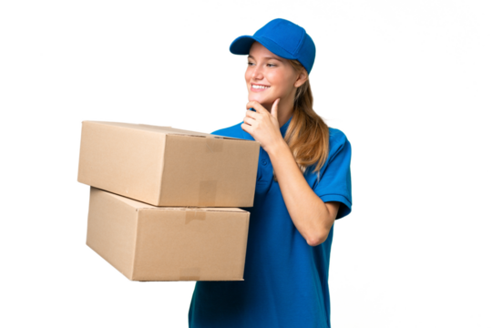 Delivery caucasian woman over isolated background looking to the side and smiling