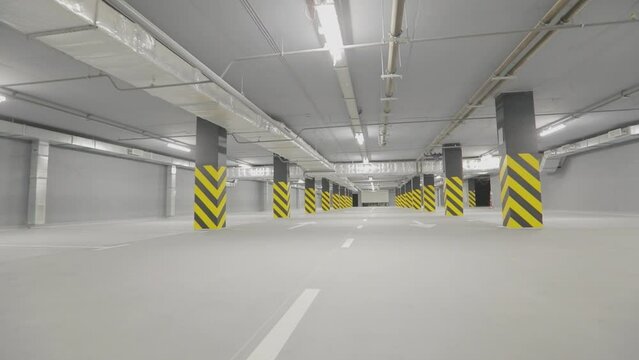 Bright modern car parking. Empty underground parking. Modern empty underground parking.