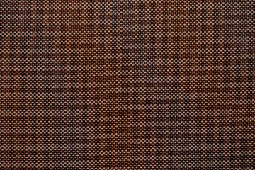 Texture and background of upholstery fabric in brown color. Fabric sample texture as background and...