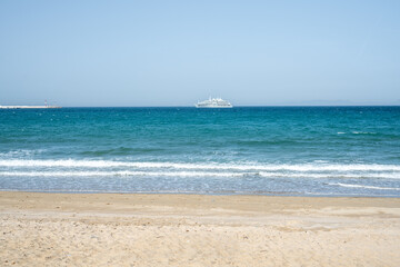 Cruise ship close to a Mediterranean beach